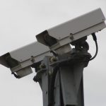 An image of two CCTV cameras in situ from Umbrella Security Services.